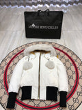 Moose Knuckles Women's White Bomber Jacket with Pom-Pom Hood