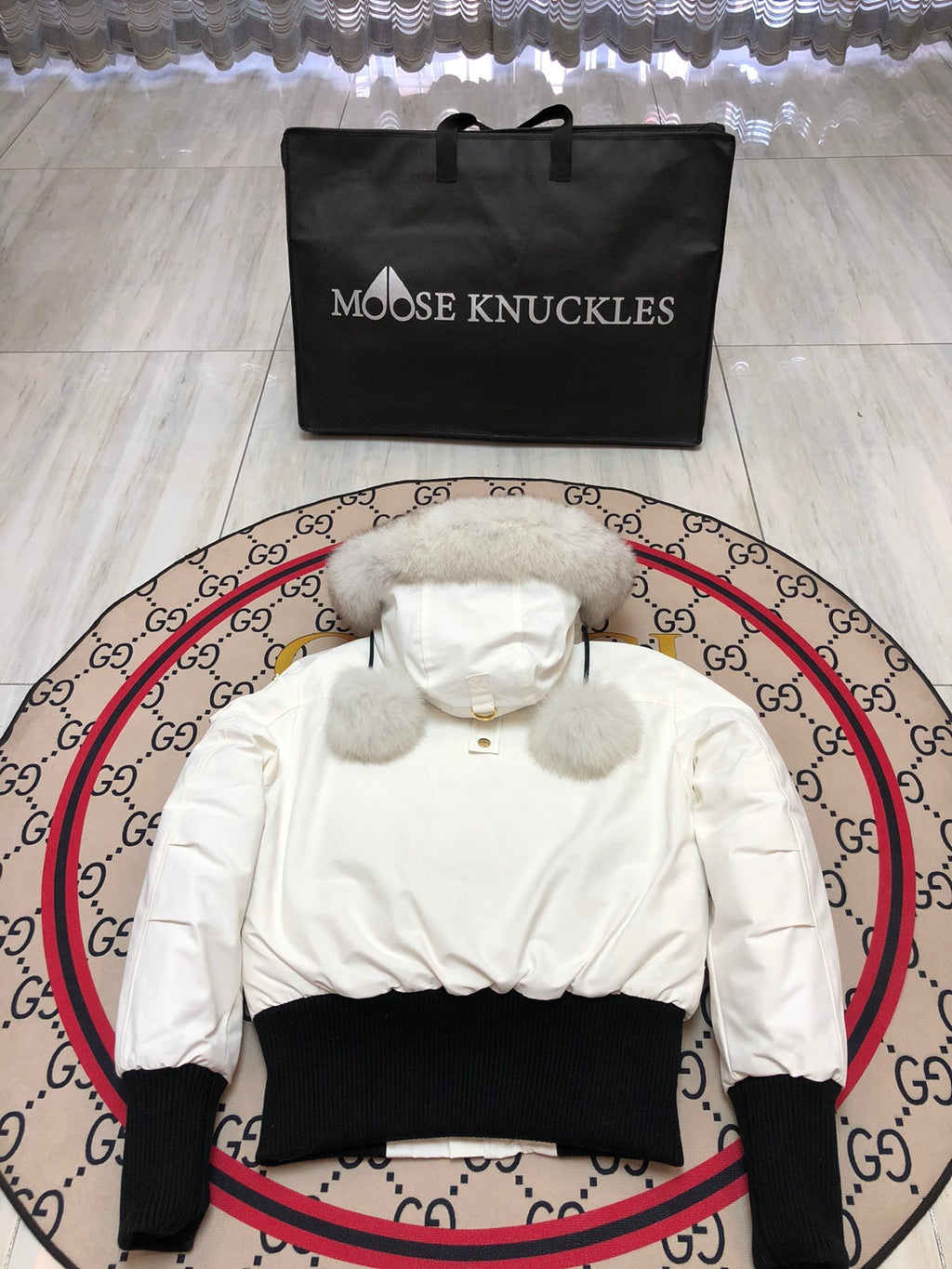 Moose Knuckles Women's White Bomber Jacket with Pom-Pom Hood